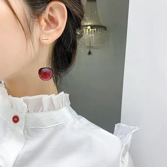 AVIGHNA's Trendy Round Korean Red Cherry Gold Plated Stem Dangle Earrings and these earrings offer a perfect blend of whimsy and sophistication. Whether for everyday wear or special occasions, these earrings will brighten your style with a pop of color an