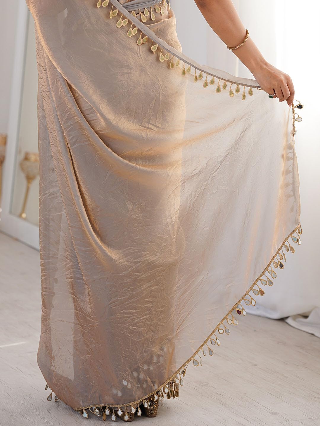 AKHILAM Women's Beige Satin Solid Mirror Work Saree With Unstitched Blouse Piece (82KAVI8204_RT)