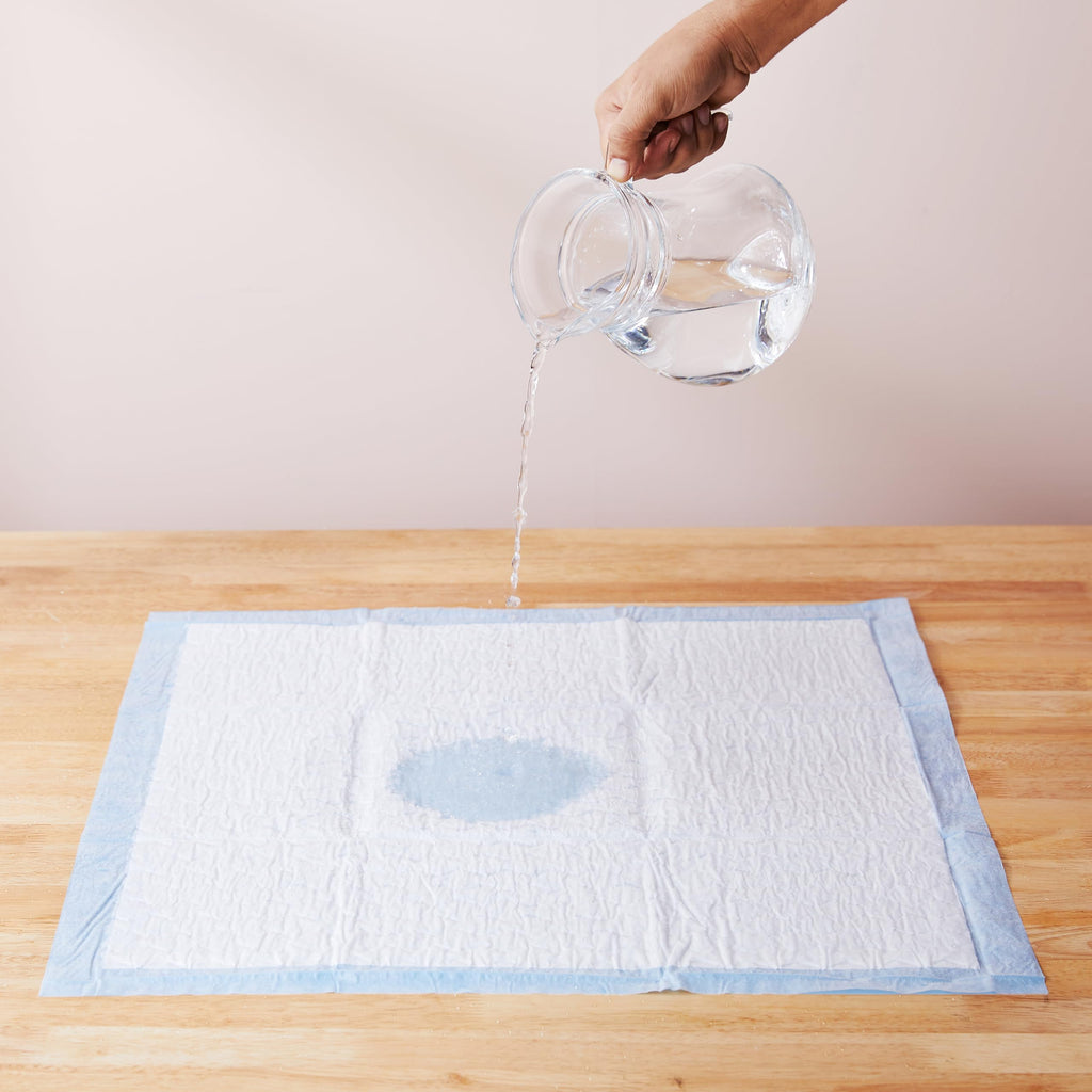 Amazon Basics Dog And Puppy Pee Pads | Pack Of 20 | 24 X 23 Inches | Leak-Proof, Quick-Dry Design For Potty Or Indoor Training | Heavy Duty Absorbency